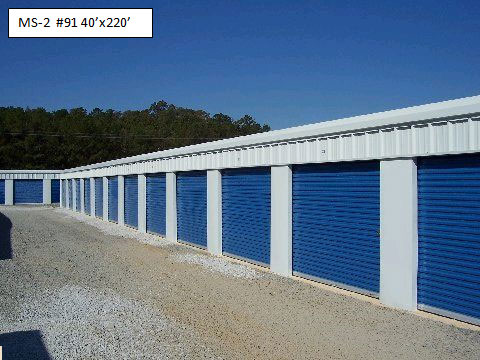 A self-storage facility with multiple mini storage buildings in a row