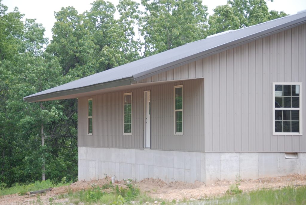Siding added to a residential metal home building package.