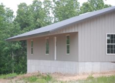Siding added to a residential metal home building package.
