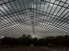 
The roof of a steel horse arena that was built by Worldwide Steel Buildings.