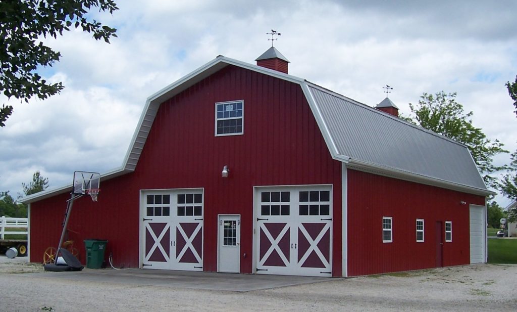 Gabrel style barn with cupola and Dutch doors.