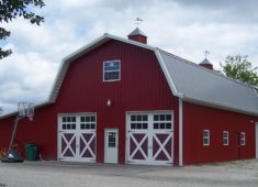 Gabrel style barn with cupola and Dutch doors.