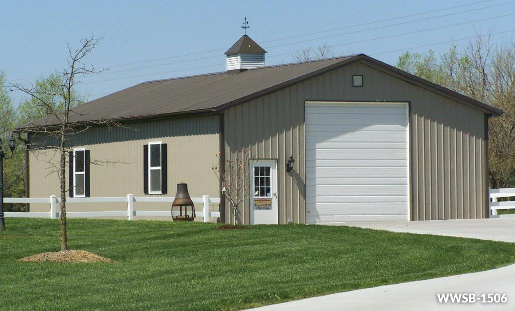 A metal garage with a beige exterior and a white garage door