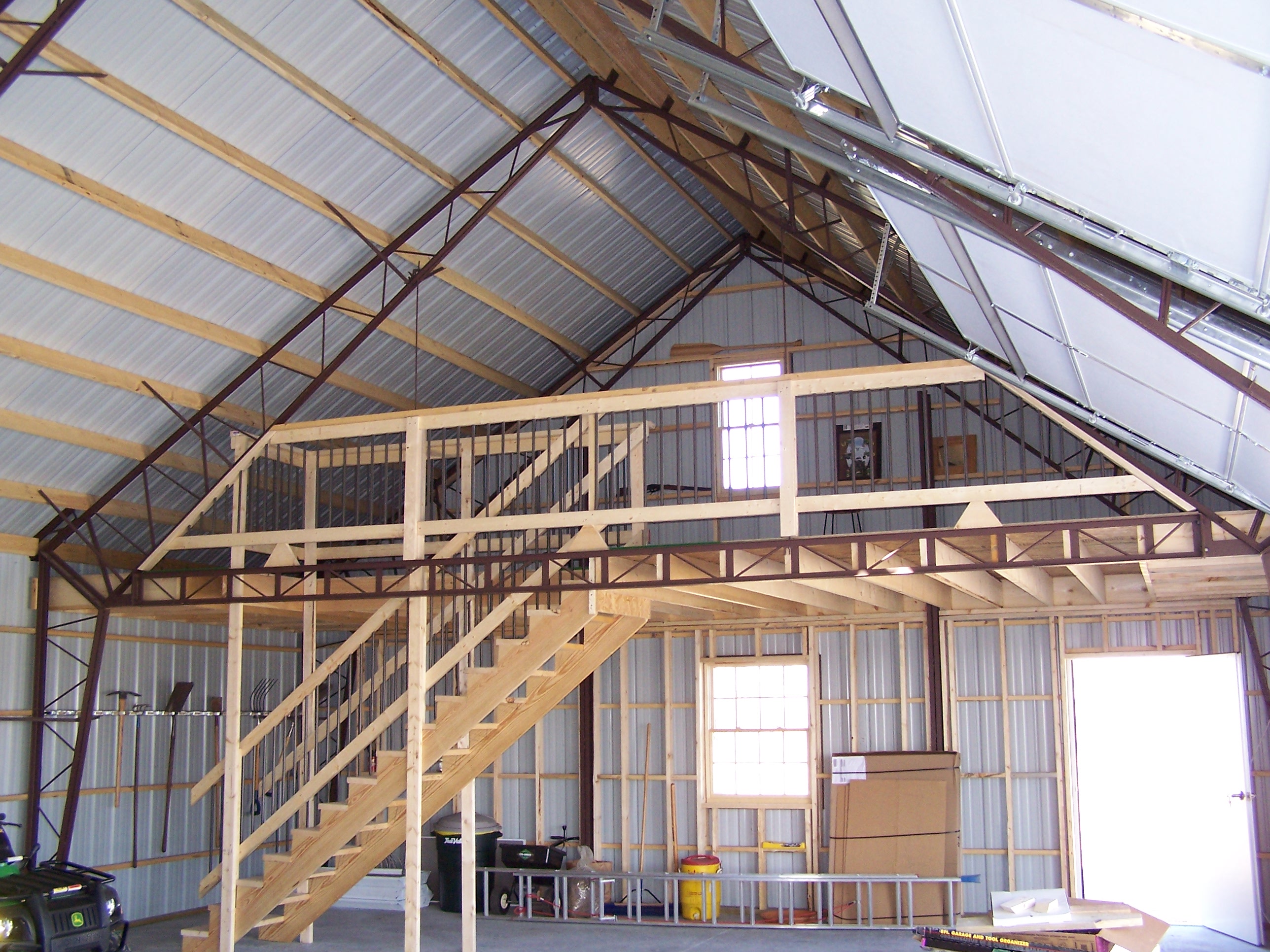 A mezzanine ceiling built inside of a metal building by Worldwide Steel Buildings.
