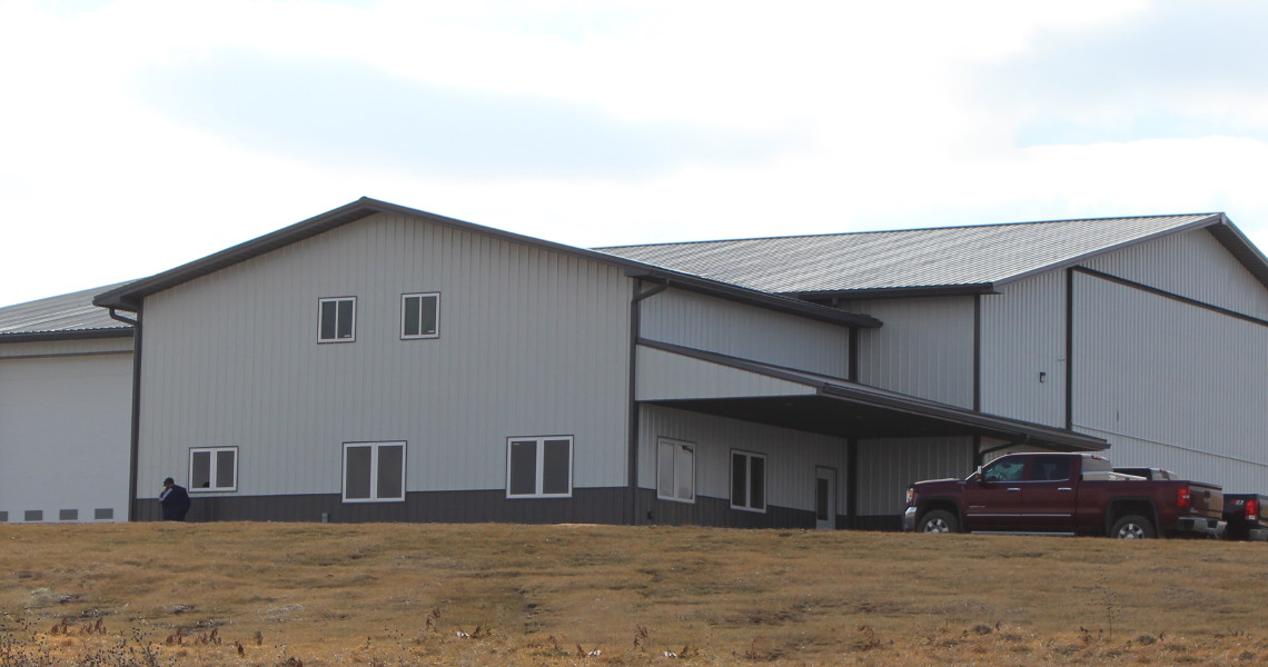 Storage building for large agricultural equipment in Perry Kansas by Worldwide Steel Buildings