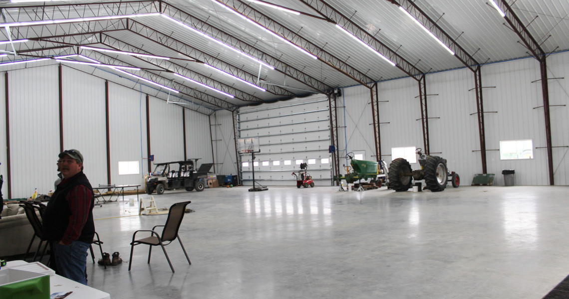 Agricultural steel building in Perry KS with features like large doors and attached living space by Worldwide Steel Buildings