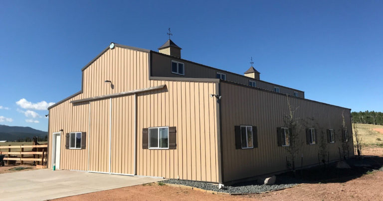 A metal building designed and built by Worldwide Steel Buildings