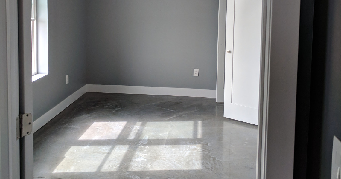 An interior shot of light gray tile flooring