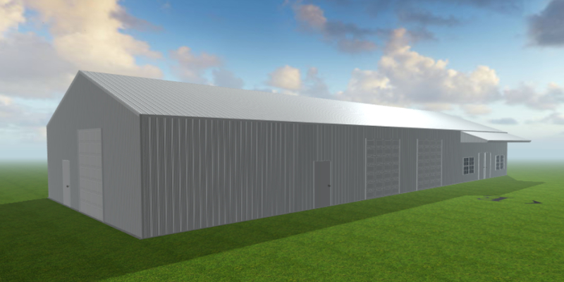 A large, gray metal warehouse, serving as a rental store, features multiple roll-up garage doors and a side entrance. It stands on a grass-covered area with soft shadows cast by the partly cloudy sky over the building and surrounding landscape.