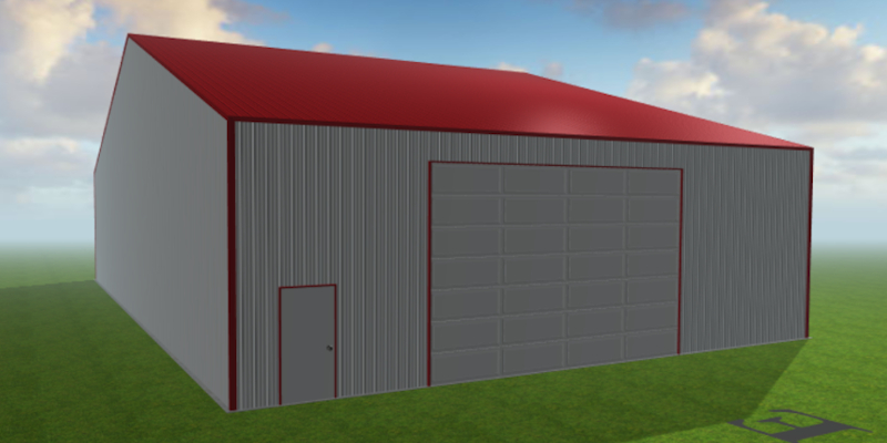 A large metal warehouse with a red roof and gray walls stands on a grassy field, ideal for storing TrailerMan Trailers. It features a big garage door and a smaller adjacent entry door. The sky is partly cloudy.