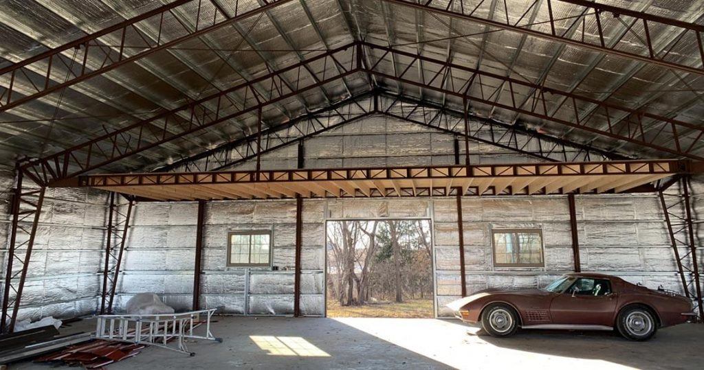 Metal garage interior with lots of space and high ceilings.
