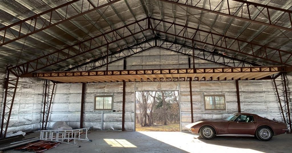 Metal garage interior with lots of space and high ceilings.