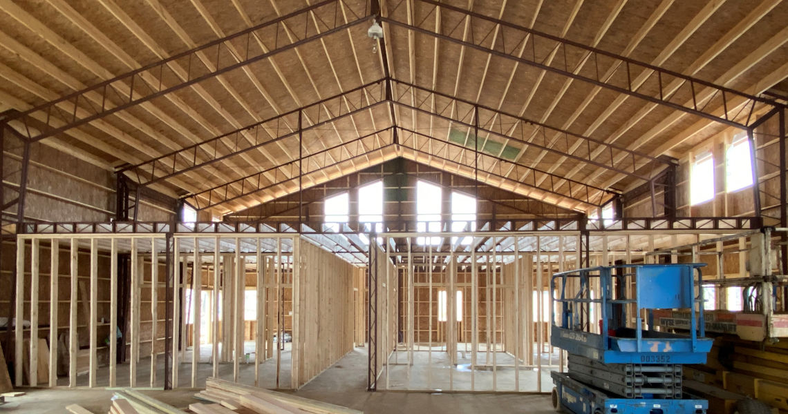 Post barndo interior during construction