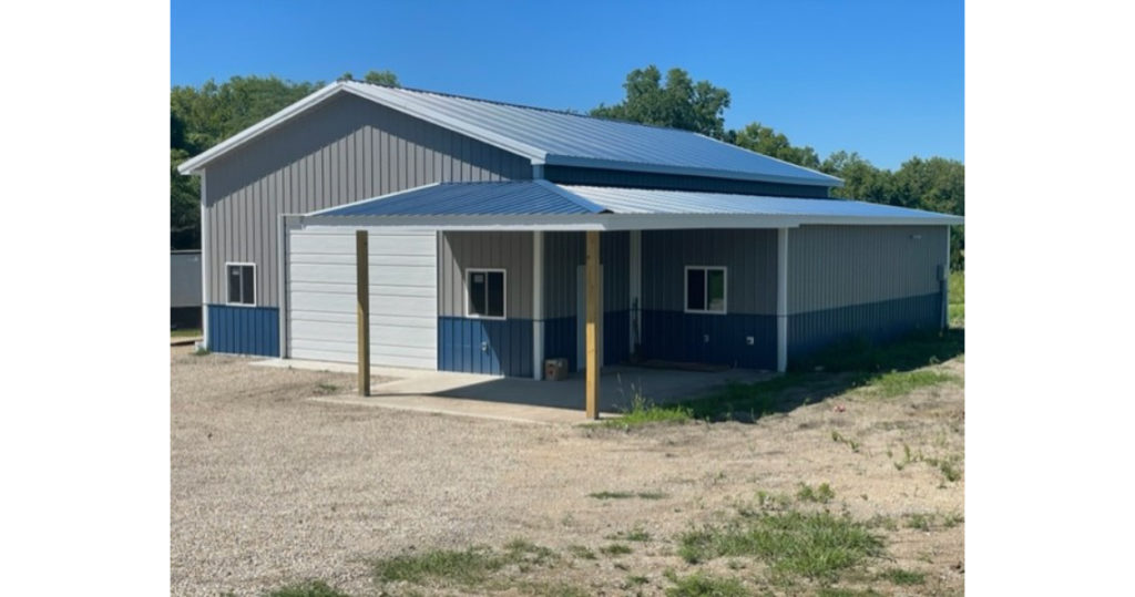 Newly-constructed steel garage from Worldwide Steel Buildings.