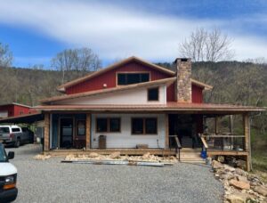 Steel Frame Home with Red and White Siding