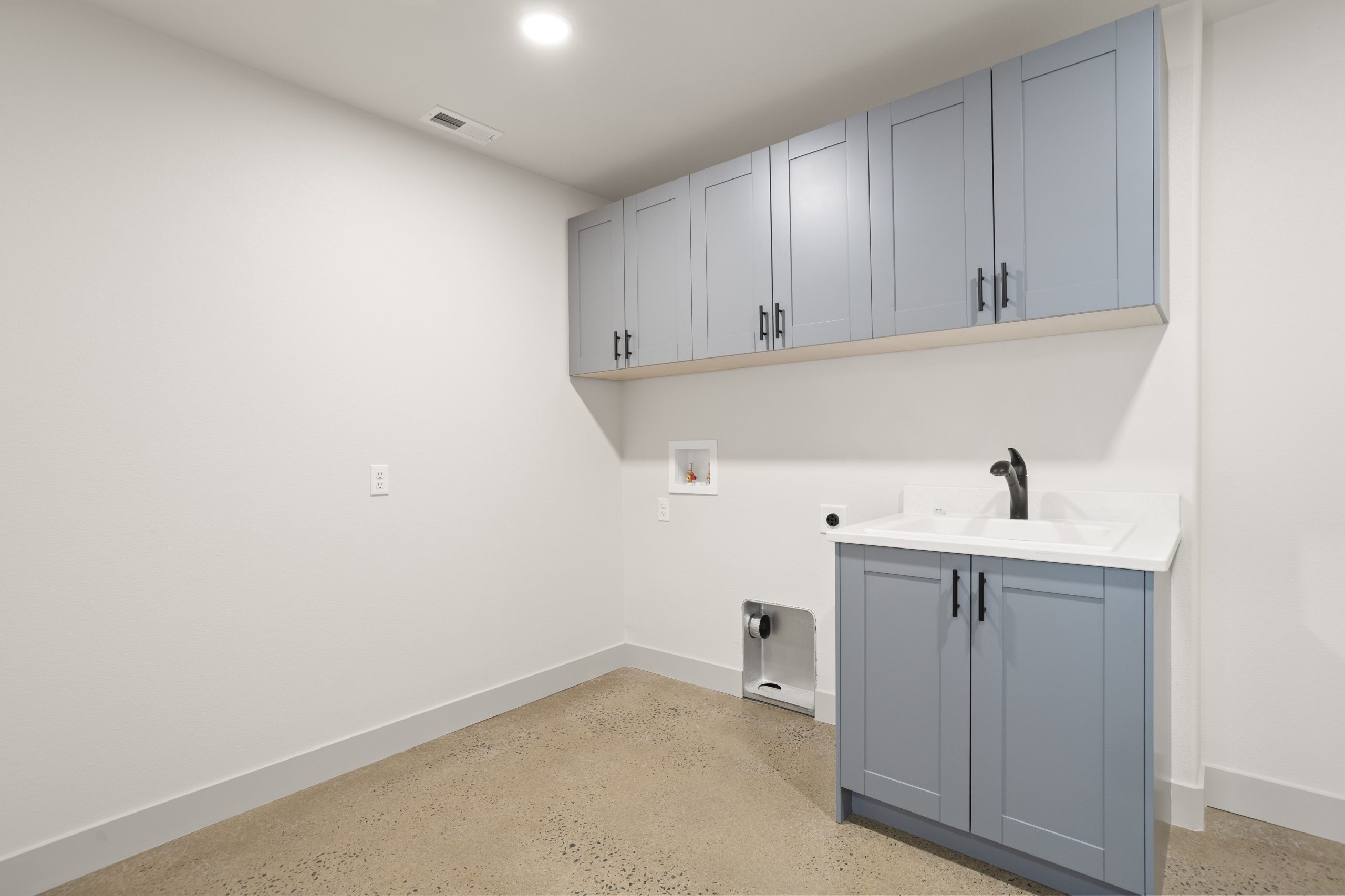 Cabinets and sink inside a barndominium in Cheyenne, Wyoming